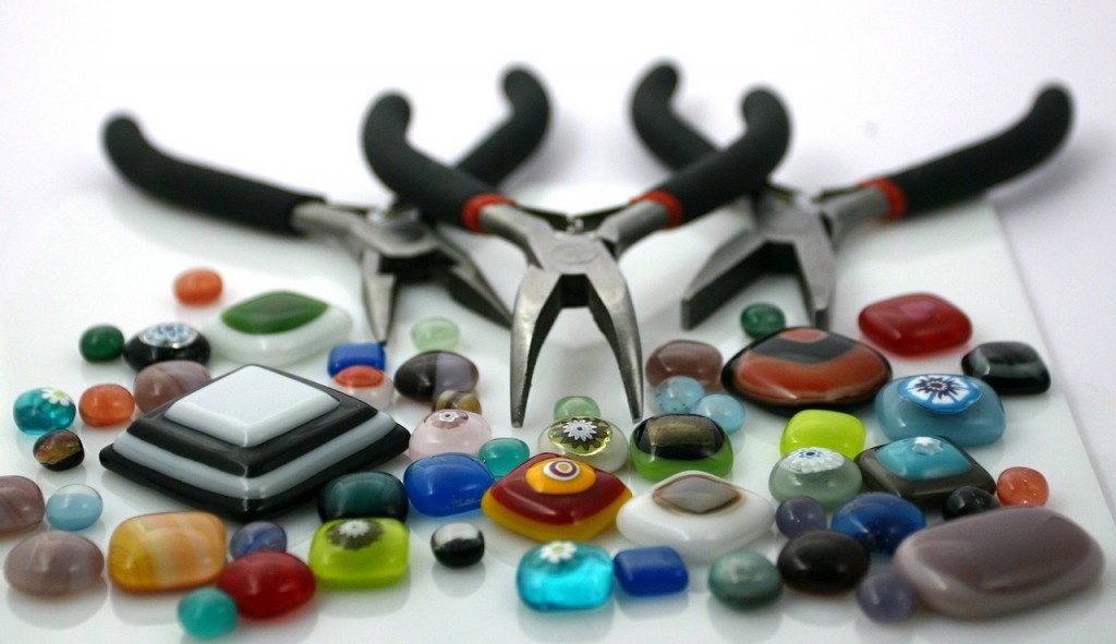 Image of glass beads and jewellery pliers